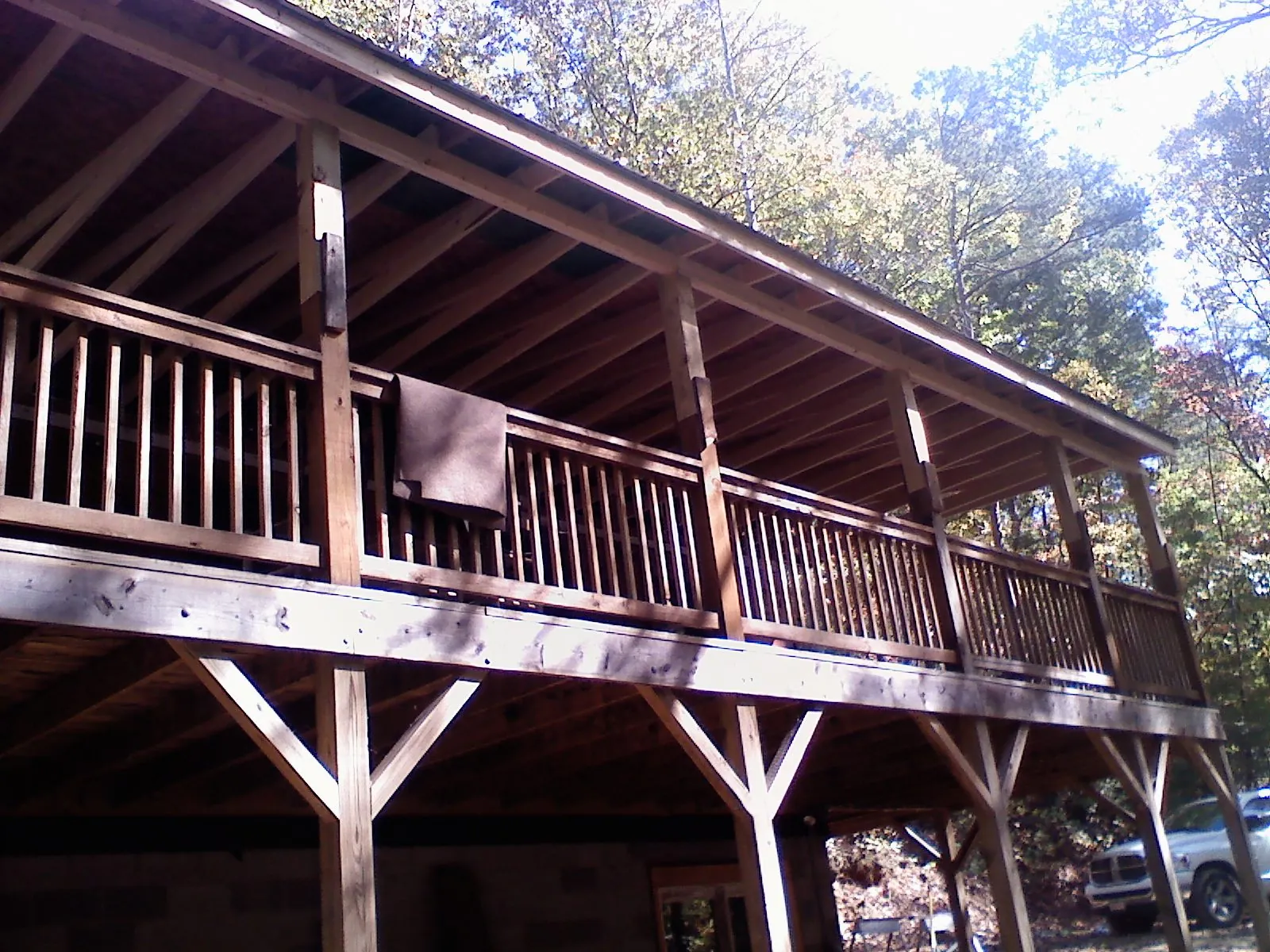 Timber framing under a new elevated porch and deck — Roof Leak Repair in Kremlin by Roofing Brothers